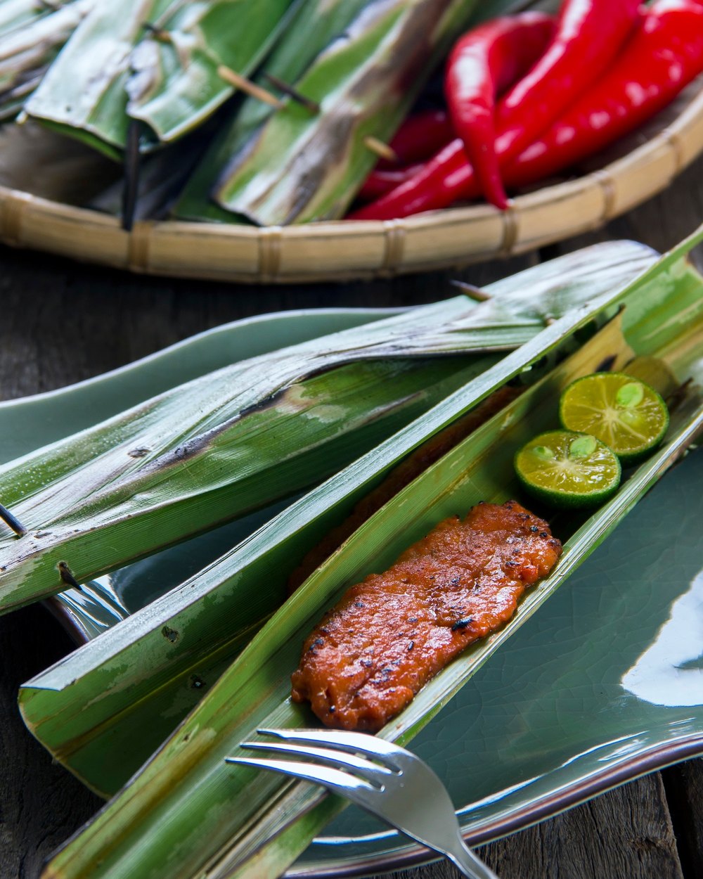 Otak-Otak parcels in charred banana leaf